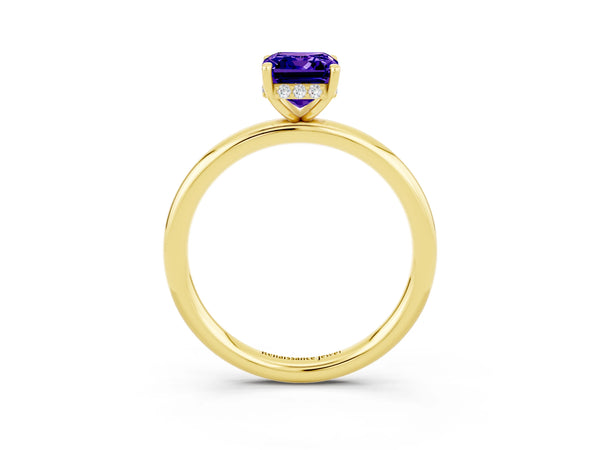Yellow gold Emerald Cut Tanzanite Solitaire Ring with Thin Band and Four-Prong Setting