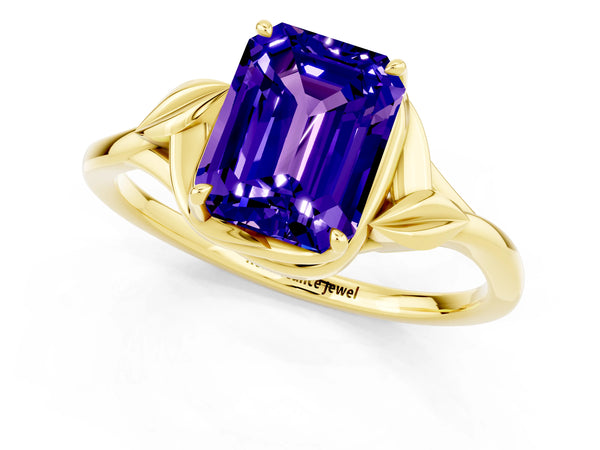 Yellow gold Emerald Cut Tanzanite Solitaire Ring with Twist Band and Four-Prong Setting