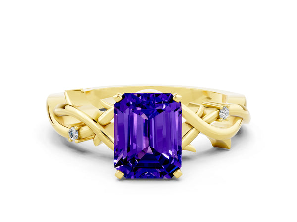 Yellow gold Emerald Cut Tanzanite Solitaire Ring with Twisted Band and Prong Setting