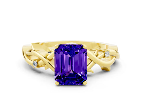Yellow gold Emerald Cut Tanzanite Solitaire Ring with Twisted Band and Prong Setting