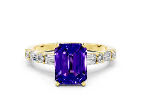 Yellow gold Emerald Cut Tanzanite Solitaire with Side Baguettes and Channel Set Band