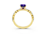 Yellow gold Emerald Cut Tanzanite Solitaire with Side Stones on a Pavé Band and Four-Prong Setting_3