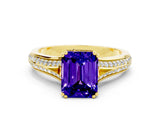 Yellow gold Emerald Cut Tanzanite Split Shank Engagement Ring with Pavé Band