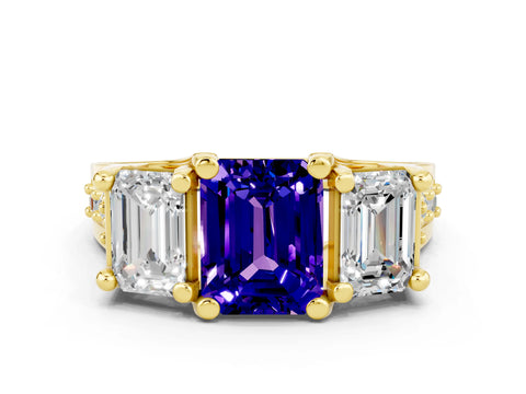 Yellow gold Emerald Cut Tanzanite Three-Stone Ring with Channel Set Band and Four-Prong Setting