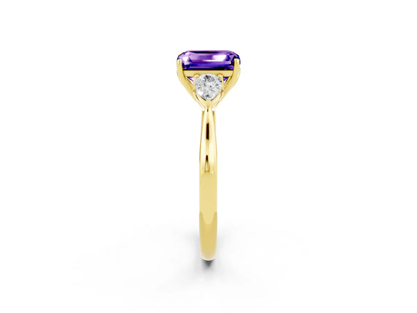 Yellow gold Emerald Cut Tanzanite Three-Stone Ring with Pear  Side Stones and Prong Setting