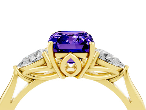 Yellow gold Emerald Cut Tanzanite Three-Stone Ring with Pear Side Stones and Four-Prong Setting_16