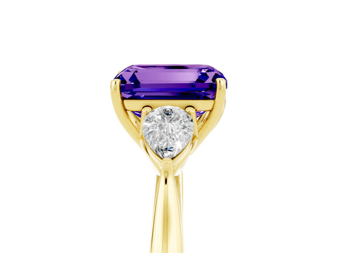 Yellow gold Emerald Cut Tanzanite Three-Stone Ring with Pear Side Stones and Four-Prong Setting_17