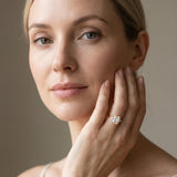 Yellow gold Emerald Cut Three-Stone Solitaire Ring with Round Accent Diamonds and Four-Prong Setting_50