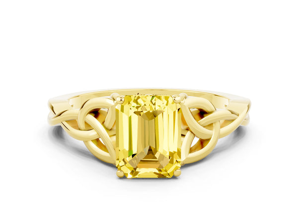 Yellow gold Emerald Cut Yellow Sapphire Solitaire Engagement Ring with Celtic Knot Band and Four-Prong Setting