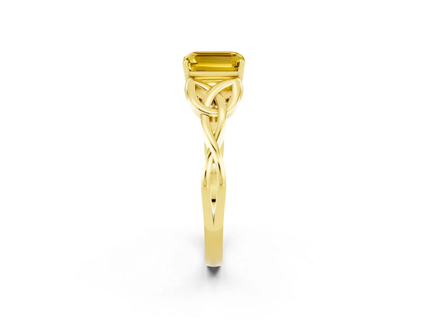 Yellow gold Emerald Cut Yellow Sapphire Solitaire Engagement Ring with Celtic Knot Band and Four-Prong Setting