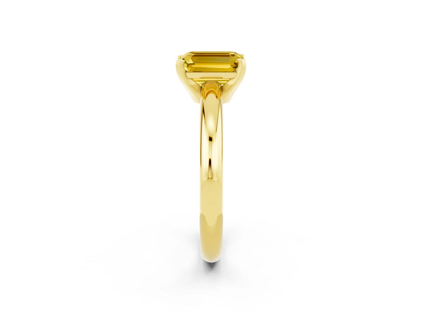 Yellow gold Emerald Cut Yellow Sapphire Solitaire Engagement Ring with Round Band and Four-Prong Setting