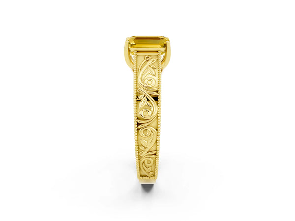 Yellow gold Emerald Cut Yellow Sapphire Solitaire Ring with Engraved Band and Four-Prong Setting