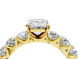 Yellow gold Emerald Diamond Prong Setting with Side Stones on a Pave Band_160