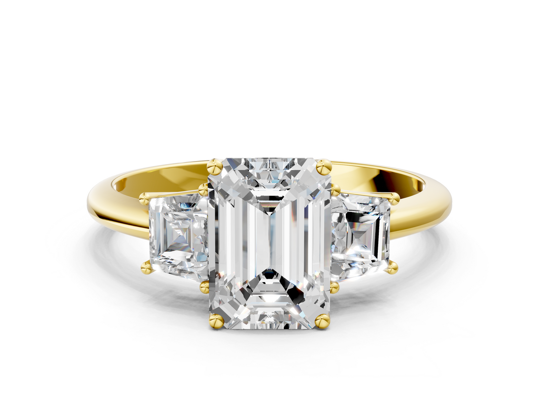 Yellow gold Emerald Diamond Three-Stone Ring with Trapezoid Side Stones and Prong Setting_23