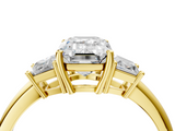 Yellow gold Emerald Diamond Three-Stone Ring with Trapezoid Side Stones and Prong Setting_27