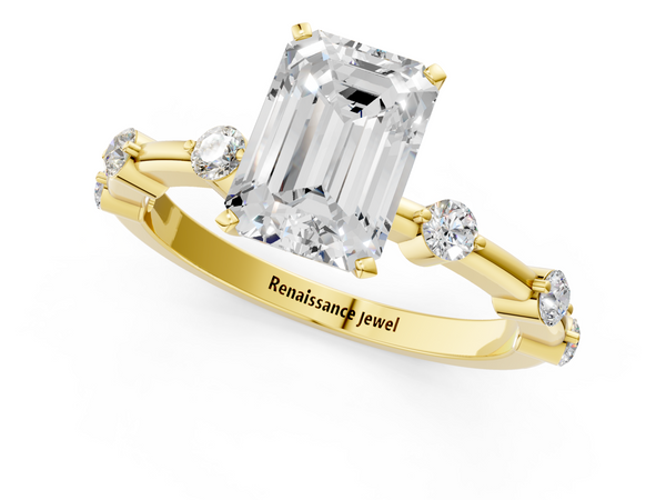 Yellow gold Emerald Solitaire Diamond Ring with Bezel Set Side Stones and Prong Setting