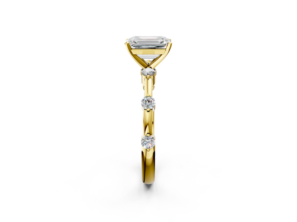 Yellow gold Emerald Solitaire Diamond Ring with Bezel Set Side Stones and Prong Setting