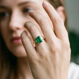 Yellow gold Emerald Solitaire Diamond Ring with Channel-Set Baguette Band and Four-Prong Setting_143