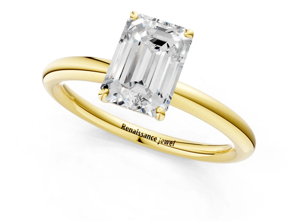 Yellow gold Emerald Solitaire Diamond Ring with Four-Prong Setting on a Plain Band
