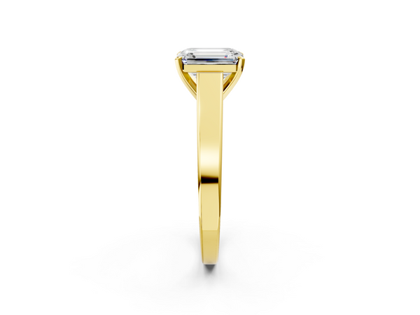 Yellow gold Emerald Solitaire Engagement Ring with Four-Prong Setting and Tapered Band