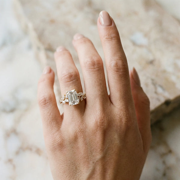 Yellow gold Emerald Solitaire Marquise Twist Band with Six-Prong Setting