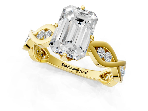 Yellow gold Emerald Solitaire Twist Band with Leaf Prong Setting