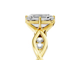 Yellow gold Emerald Solitaire Twist Band with Leaf Prong Setting