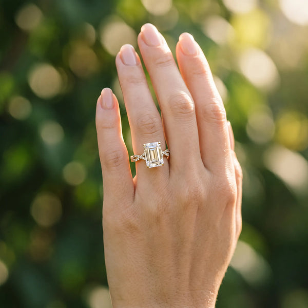 Yellow gold Emerald Solitaire Twisted Pave Band with Four-Prong Setting