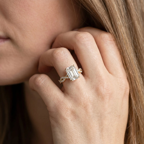 Yellow gold Emerald Solitaire Twisted Pave Band with Four-Prong Setting
