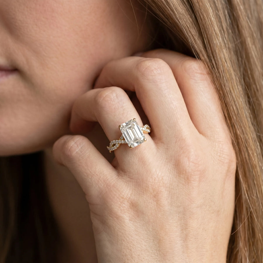 Yellow gold Emerald Solitaire Twisted Pave Band with Four-Prong Setting