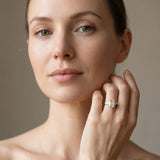 Yellow gold Emerald Solitaire with Tapered Baguette Side Stones on a Classic Band with Four-Prong Setting_14