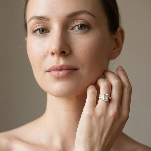 18K Yellow Gold 2.91 Carat D VVS2 Emerald Solitaire with Tapered Baguette Side Stones on a Classic Band with Four-Prong Setting