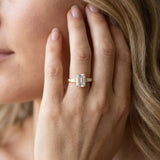 18K Yellow Gold 2.91 Carat D VVS2 Emerald Solitaire with Tapered Baguette Side Stones on a Classic Band with Four-Prong Setting