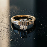 18K Yellow Gold 2.91 Carat D VVS2 Emerald Solitaire with Tapered Baguette Side Stones on a Classic Band with Four-Prong Setting