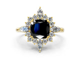 Yellow gold Fancy Black Cushion Cut Halo Diamond Cluster Ring with Marquise and Round Stones on a White Gold Band with Prong Setting