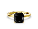 Yellow gold Fancy Black Cushion Cut Solitaire Engagement Ring with Cathedral Band and Four-Prong Setting