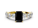 Yellow gold Fancy Black Emerald Cut Diamond Prong Setting with Side Stones on a Pave Band