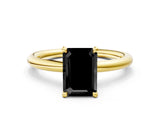 Yellow gold Fancy Black Emerald Cut Diamond Solitaire Ring with Thin Band and Four-Prong Setting