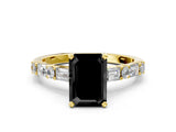 Yellow gold Fancy Black Emerald Cut Diamond Solitaire with Side Baguettes and Channel Set Band