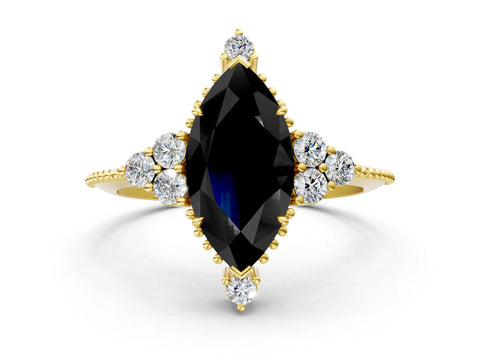 Yellow gold Fancy Black Marquise Cut Brilliant Diamond with Cluster Setting on a Beaded Band and Four-Prong Setting