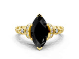 Yellow gold Fancy Black Marquise Cut Diamond Solitaire Ring with Filigree Band and Four-Prong Setting