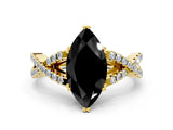 Yellow gold Fancy Black Marquise Cut Diamond Solitaire Ring with Four-Prong Setting and Twisted Pavé Band