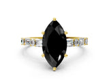 Yellow gold Fancy Black Marquise Cut Diamond Solitaire with Side Baguettes and Channel Set Band