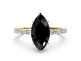 Yellow gold Fancy Black Marquise Cut Diamond Solitaire with Side Stones on a Pavé Band and Four-Prong Setting