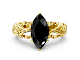 Yellow gold Fancy Black Marquise Cut Solitaire Diamond Leaf-Inspired Vine Band Ring with Prong Setting
