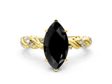 Yellow gold Fancy Black Marquise Cut Solitaire Twisted Band with Pavé Accents and Four-Prong Setting