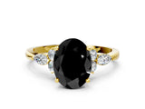 Yellow gold Fancy Black Oval Cut Brilliant Diamond Solitaire Ring with Pear Side Stones and Four-Prong Setting_3