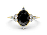 Yellow gold Fancy Black Oval Cut Brilliant Diamond with Cluster Setting on a Beaded Band and Four-Prong Setting