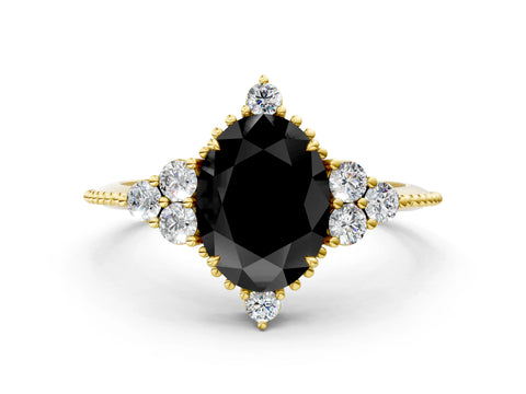 Yellow gold Fancy Black Oval Cut Brilliant Diamond with Cluster Setting on a Beaded Band and Four-Prong Setting