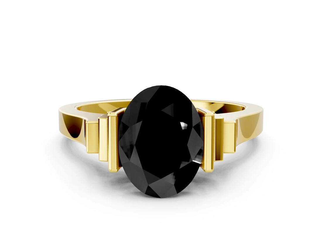 Yellow gold Fancy Black Oval Cut Brilliant Solitaire Diamond Ring with Channel Set Band and Bar Prong Setting